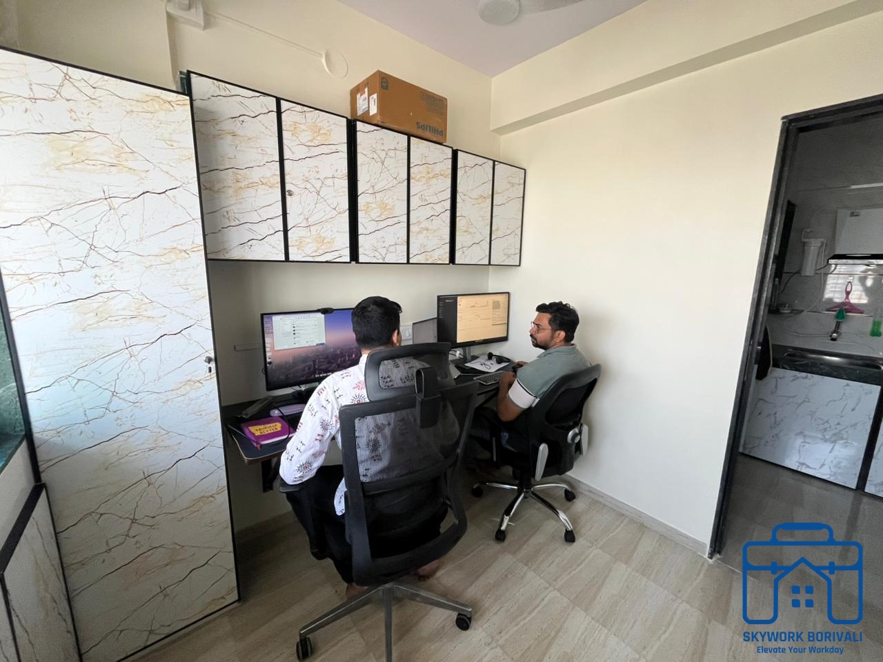 Members working in the shared cabin